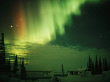 The Aurora Borealis Shimmers in the Night Sky