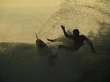 A Surfer Wipes out on a Breaking Wave