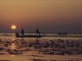 Buy Fishermen Take in the First Rays of the Rising Sun on Lake Okeechobee at AllPosters.com