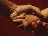 A Father Holds His Daugters Small Hand