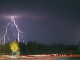 Buy Lightning and Time Exposure of Taillights on a Rainy Road at AllPosters.com
