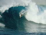 Buy A Surfer Rides a Powerful Wave off the North Shore of Maui Island at AllPosters.com