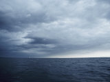 Buy A Cloudy Sky Hangs over Lake Michigan at AllPosters.com