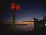 Buy A Sunset View of the Brooklyn Bridge and a Nearby Stoplight at AllPosters.com