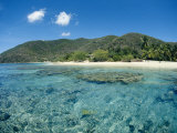 Buy A View of Coral Reefs and Clear Water Surrounding a Tropical Beach at AllPosters.com