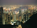 Buy The Hong Kong Skyline is Lit up at Night with Thousands of Lights at AllPosters.com