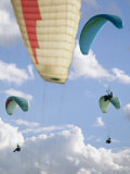 View from Below at Soaring Paragliders against a Cloudy Sky, Near Draper, Utah