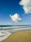 Atlantic Ocean Waves Break Upon the Beach on a Sunny Day with Clouds