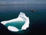 Buy Towing an Iceberg Away from an Oil Platform at AllPosters.com