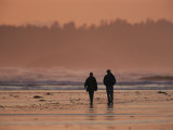 Two People Walk Along the Tidal Flats of Clayoquot Sound