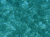 A Detail of Sun-Dappled, Clear Blue Water