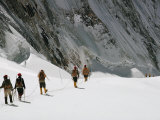 Buy Roped Together, Mount Everest Expedition Members Trek Across a Snowfield at AllPosters.com