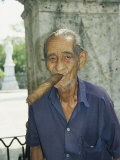 Buy An Old Man Smokes an Over-Sized Cigar at AllPosters.com
