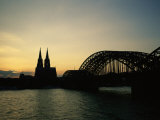 The Cologne Cathedral and Hohenzollern Bridge Silhouetted at Dusk