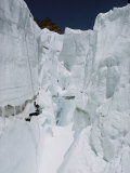 Buy A Man Participating in Crevasse-Rescue Practice at AllPosters.com