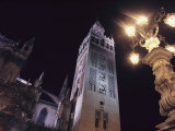 Buy La Giralda, a Part of the Seville Cathedral, at Night at AllPosters.com