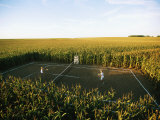 Buy An Umpire Watches a Game on a Tennis Court Carved from a Cornfield at AllPosters.com