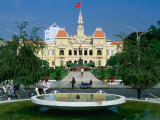 People Riding Bikes Past Fountain and Town Hall, Ho Chi Minh City, Ho Chi Minh, Vietnam