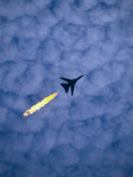 An Airforce Jet Leaves Behind a Trail of Fire During the Air Display at the Australian Grand Prix