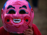 Boy Wearing Colourful Mask at Tet Nguyen Dan Celebrating Lunar New Year Holiday, Da Lat, Vietnam