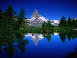 Buy The Matterhorn and Hiker Reflected in Waters of Grindjisee, Valais, Switzerland at AllPosters.com