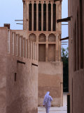 Man Walking in Lanes of Bastikia Quarter, Dubai, United Arab Emirates