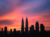 Buy City Skyline at Sunrise Dominated by Petronas Twin Towers, Kuala Lumpur, Malaysia at AllPosters.com