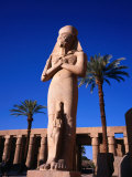 Statue of God Amun with Pharaoh Seti I at Feet in Hypostyle Hall of Karnak Temple, Luxor, Egypt