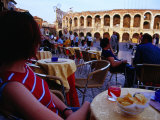Traveller Relaxing at Outdoor Cafe on Piazza Bra, Verona, Italy