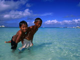Young Boys Playing in Water at White Beach, Boracay Island, Aklan, Philippines