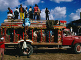 Buy People Standing on Roof of Crowded Intercity Bus, Port-Au-Prince, Ouest, Haiti at AllPosters.com
