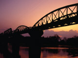 Buy Sunset on "Bridge Over the River Kwai," Kanchanaburi, Thailand at AllPosters.com