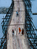 People Walking on Wooden Bridge Joining Hilltribe Villages to Mainland, Kanchanaburi, Thailand - Party Travel