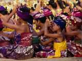 Children and Adults in Traditional Costume Praying at Pura Penataran Agung, Pura Besakih, Indonesia