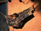Tharu Child in Hammock Near Karnali River in Western Nepal, Karnali River, Bheri, Nepal