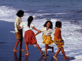 Buy Girls on Lebih Beach, South of Gianyar, Play along the Fringe of Breaking Waves, Indonesia at AllPosters.com
