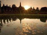 Sukhothai Ruins and Sunset Reflected in Lotus Pond, Thailand
