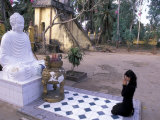 Buy Woman Praying to Buddha, Vinh Trang Pagoda, My Tho City, Vietnam at AllPosters.com