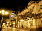 People Walk Past the San Francisco Palace in Bogota, Colombia, in This September 30, 2006 Photo