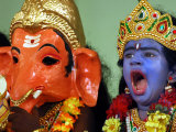 Buy A Child Dressed as Hindu God Krishna Yawns, Chennai, India, September 22, 2006 at AllPosters.com