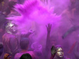 Buy People Painted with Bright Colors Dance During the Festival of Holi on March 7, 2004 at AllPosters.com