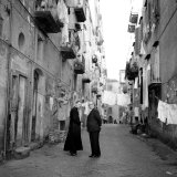 Buy A Priest Chats to an Elderly Man in a Street, Naples, Italy 1957 at AllPosters.com