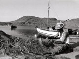 Buy Fisherman Tends to His Nets in Greece at AllPosters.com