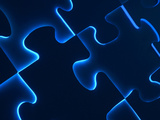 Black Puzzle with Blue Light Shining Through the Cracks