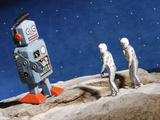 Buy Astronaut Figurines Standing Beside Gray Toy Rocket at AllPosters.com