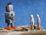 Buy Astronaut Figurines Meeting Space Robot at AllPosters.com