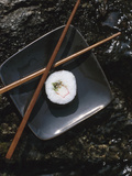 Buy Elegant Sushi and Chopsticks Beside Rushing Water at AllPosters.com