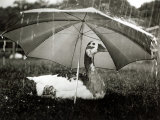 A Goose Takes Cover from the Heavy Rainfall Underneath an Umbrella, Dorset, October 1968