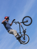 Buy Man Performing Trick on a Bicycle at AllPosters.com
