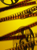 Movie Film and Reel in Yellow Light